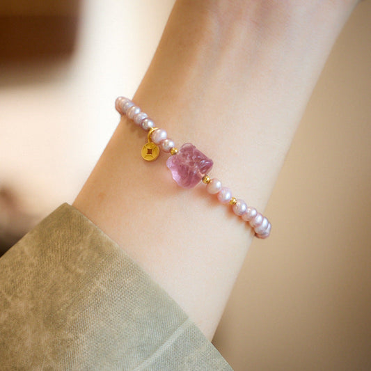 Lavendelfarbenes Mondstrahl-Perlenkristallarmband