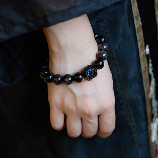 Lion Ward bracelet with sleek black stones for grounding and courage