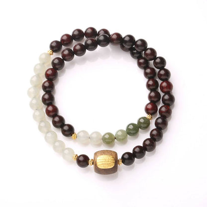 Sacred Harmony Armband aus rotem Sandelholz und Kristallen