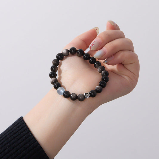 Elegant black crystal bracelet enhancing protection and clarity